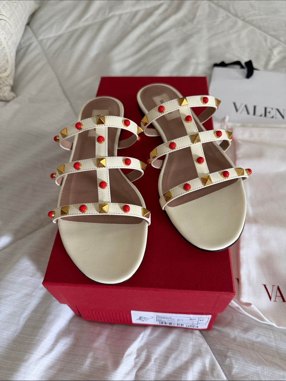 Valentino Garavani Cream Leather Rockstud Slide Sandals with Red Stud Accents